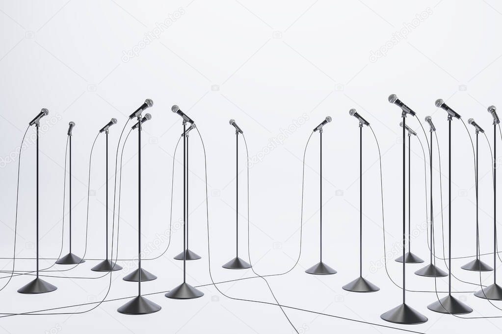 Business speaking performance concept with lots of floor stand microphones on light floor at white wall background. 3D rendering