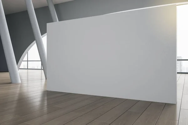 Big blank grey partition on wooden floor in modern exhibition hall with grey columns and big window. 3D rendering, mockup