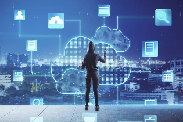 Cloud technology concept with person back touches digital screen with cloud application icons on night city background. Double exposure