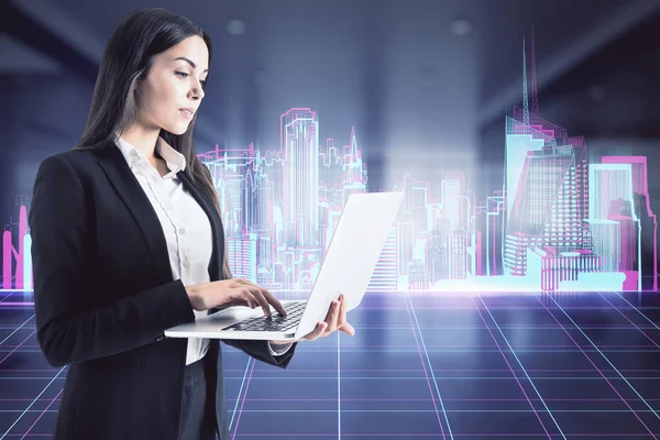 Businesswoman with a laptop standing with neon city in the background, modern business and market concept
