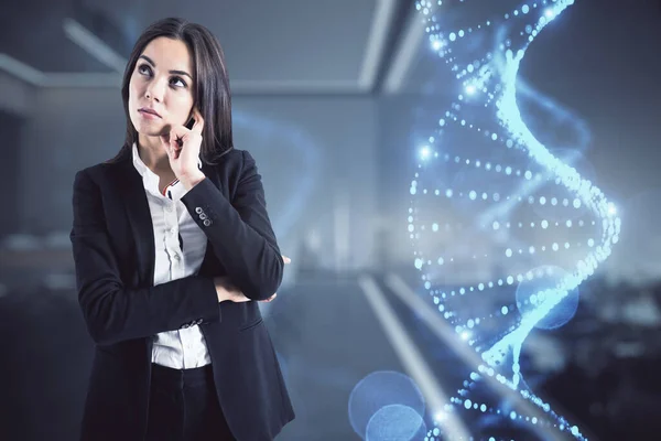 Bio engineering and nanotechnology concept with pensive businesswoman and dna strand hologram on digital background