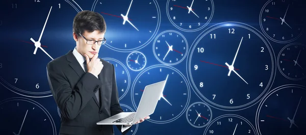 Time Management Concept Pensive Young European Businessman Laptop Creative Blue — Stock Photo, Image