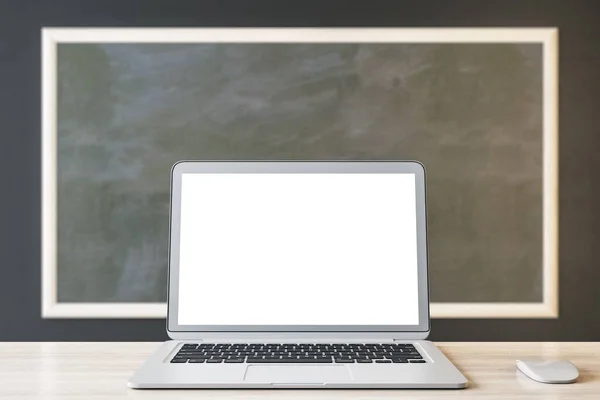 Close up of empty white laptop and mouse on chalkboard background, Education, seminar, workshop and mockup concept. 3D Rendering