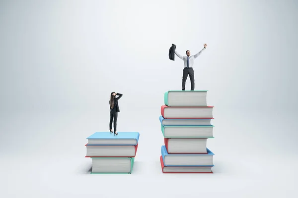 Businessman and woman standing on books on white background. Competition, education, success and knowledge concept