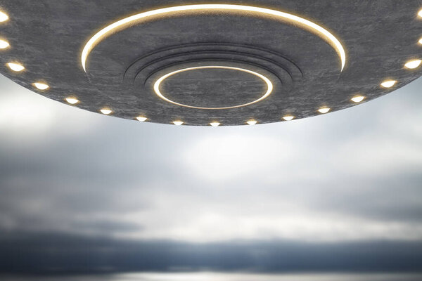 Creative grey UFO flying in dull sky with mock up place. Spaceship, invasion, mystery and science concept. 3D Rendering