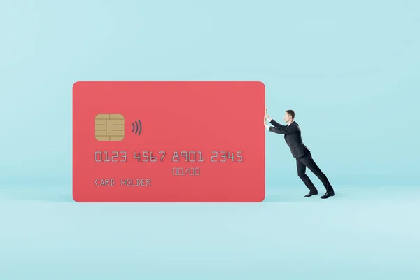 Бизнесмен Нажимает Красную Кредитку Синем Фоне Концепция Долга Кредита — стоковое фото