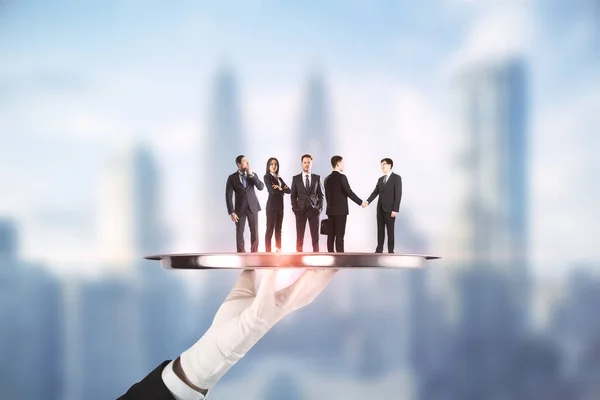 Hand Holding Silver Tray Businesspeople Abstract Blurry City Background Teamwork — 图库照片