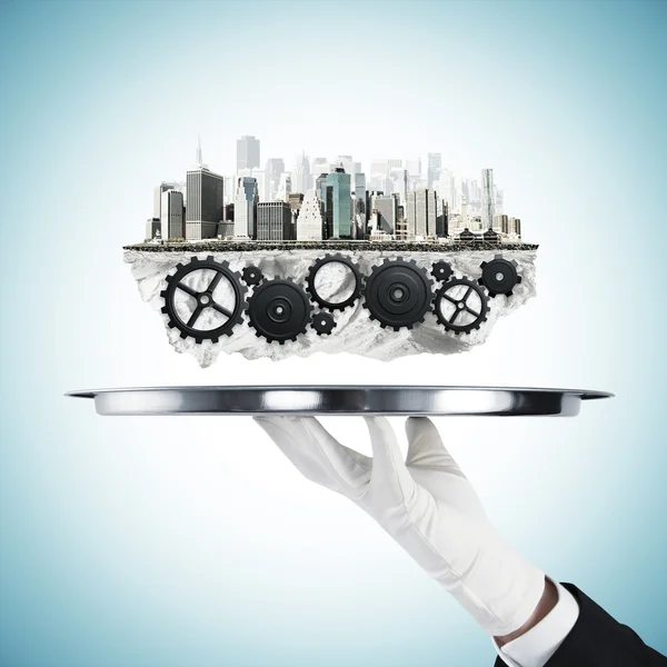 Plate with gears and city — Stock Photo, Image