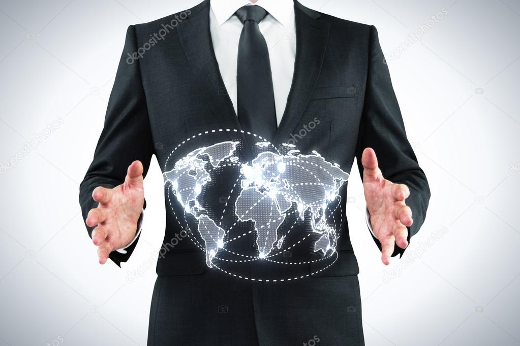 Businessman holding world map