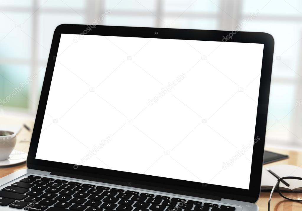 Blank laptop on office table