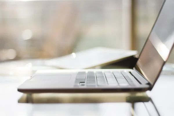 Modern laptop on table — Stock Photo, Image