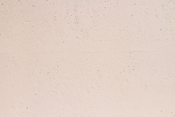 Beżowy betonowy mur tekstury — Zdjęcie stockowe
