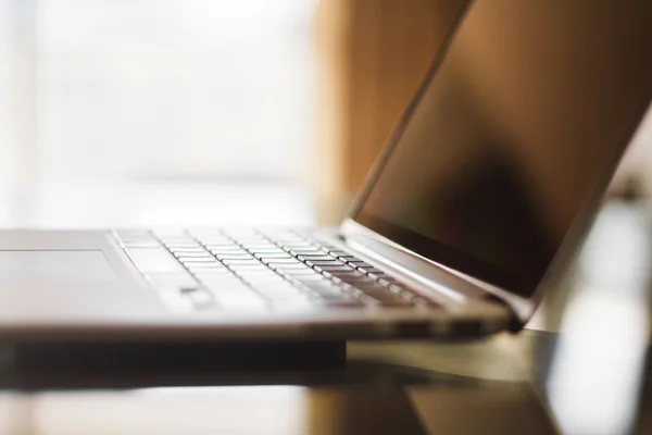 Modern laptop on the table — Stock Photo, Image