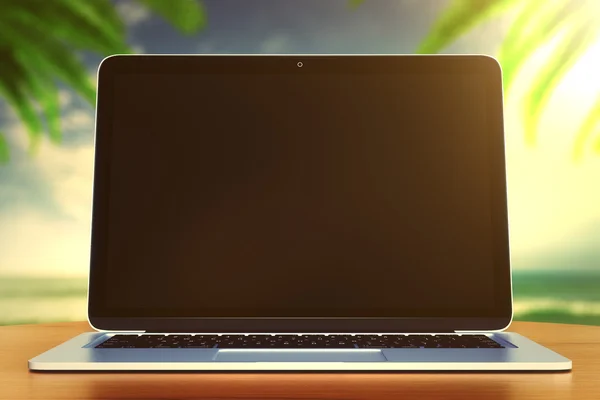 Laptop på träbord — Stockfoto