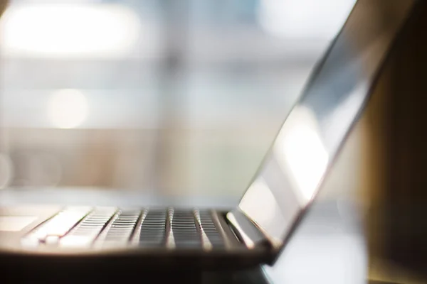 Modern laptop on table — Stock Photo, Image