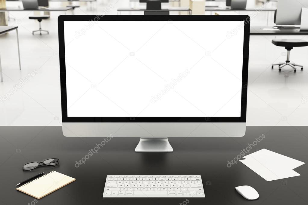 Desktop with blank computer monitor