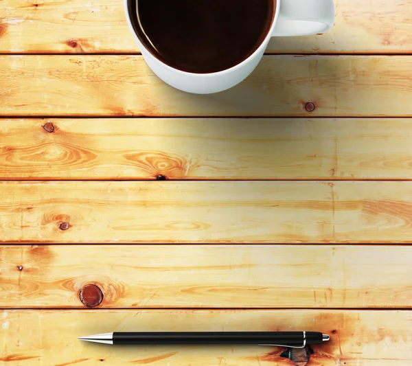 Cup of coffee and pen — Stock Photo, Image