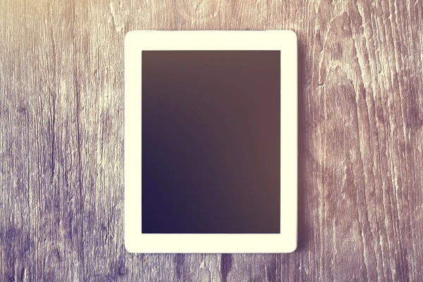 Digitální tablet na dřevěný stůl — Stock fotografie
