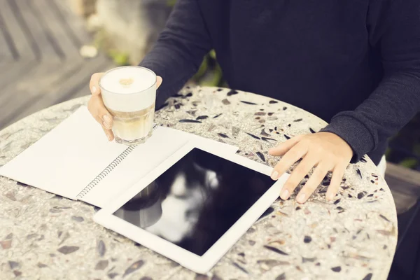 Man with blank notebook, digital tablet and coffee — Stock Photo, Image