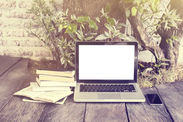 Laptop, books and cell phone — Stock Photo, Image