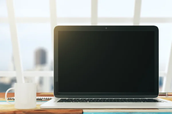 Blank laptop on the desktop — Stock Photo, Image