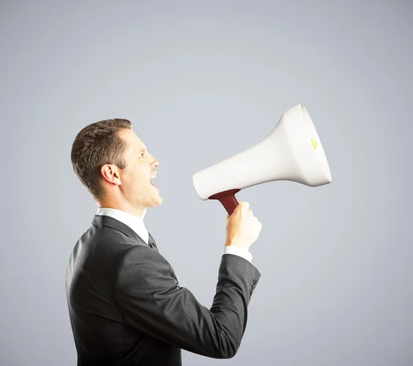 Businessman shouts a shout — Stock Photo, Image