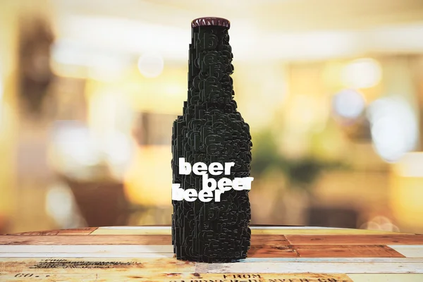 Beer concept with beer words on bottle and wooden table