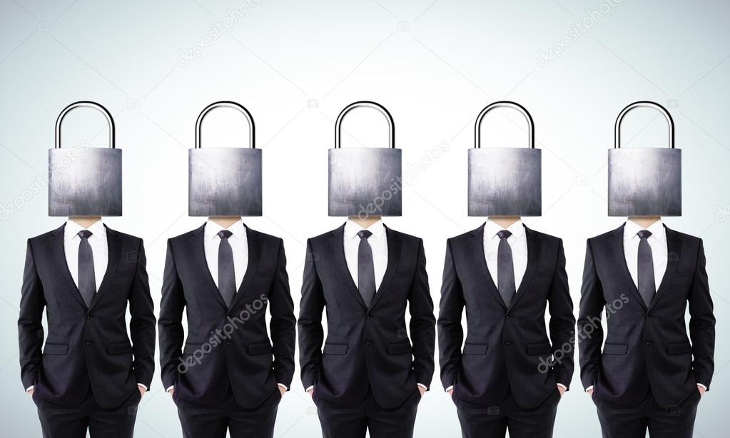 Businessmen with closed head locks