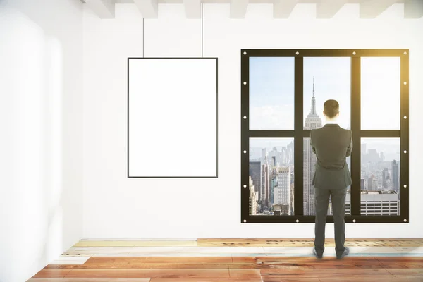 Businessman in empty loft room — Stock Photo, Image