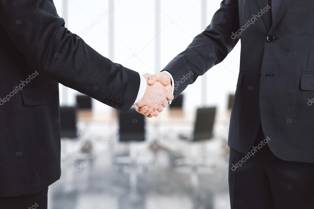Businessmen shake their hands