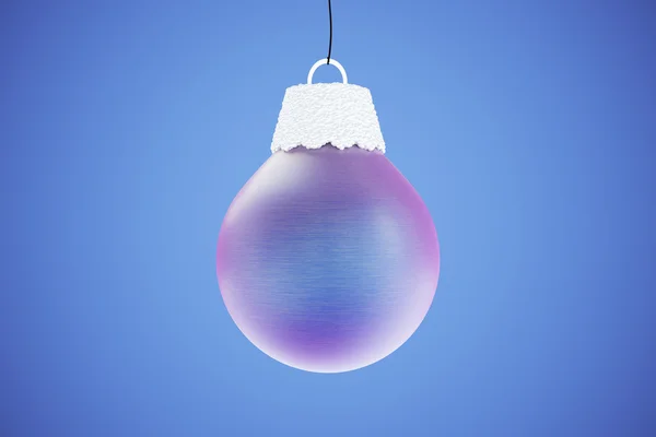Violet christmas tree ball at blue background — Stock Photo, Image