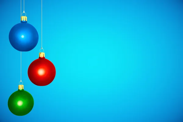 Colorful christmas tree balls at blue background — Stock Photo, Image
