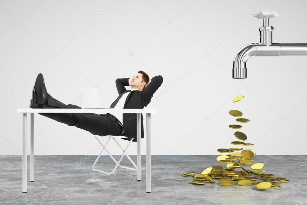 Money dripping concept with faucet and businessman resting on a 