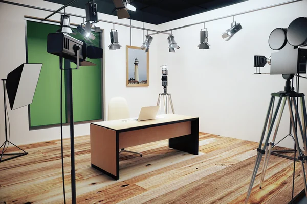 Modern photo studio with furniture and old style movie camera — Stock Photo, Image