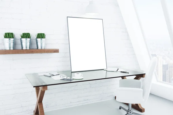 Blank white picture frame on glassy table in modern white style