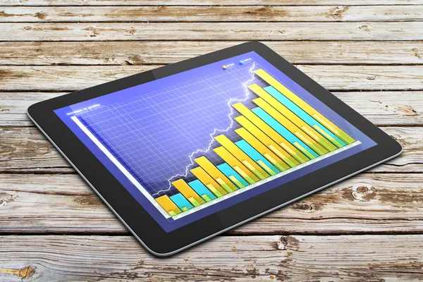 Obchodní graf na obrazovce digitální tabletu na dřevěný stůl — Stock fotografie