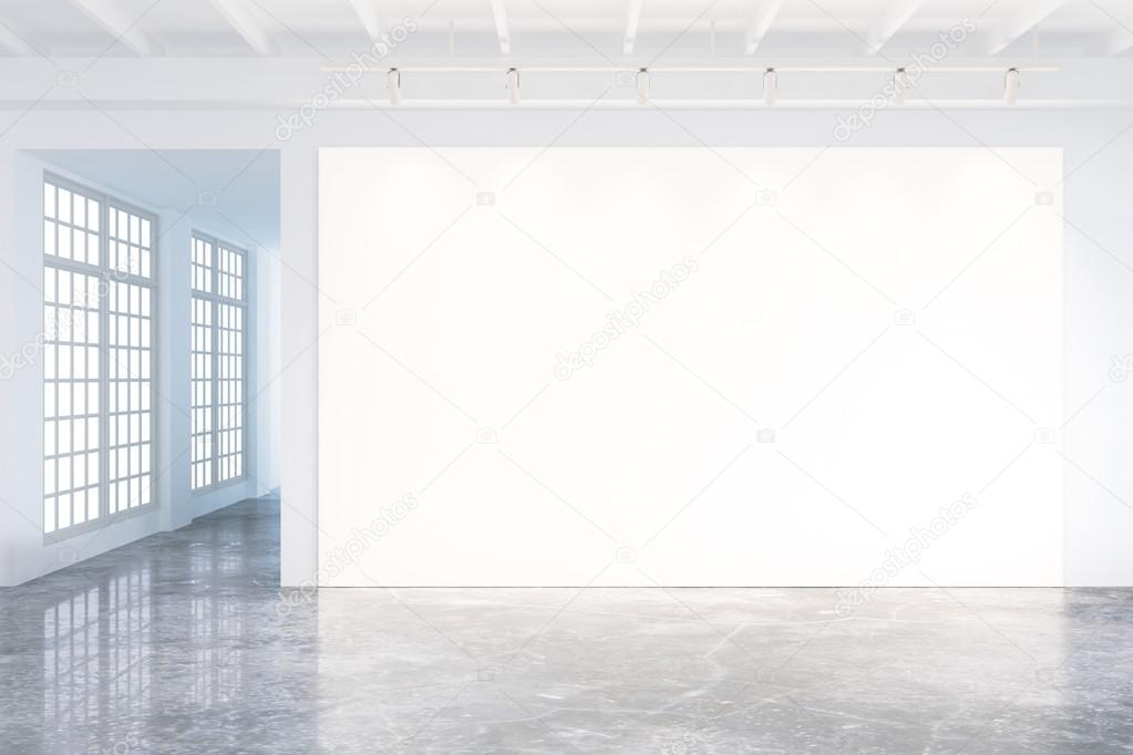 Mock up of blank poster in modern loft interior with big windows
