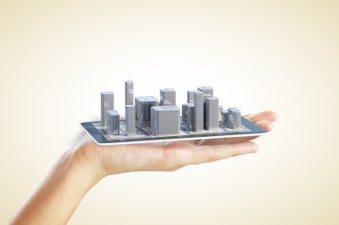 Hand shows a plan of the urban area in the cell phone clipart