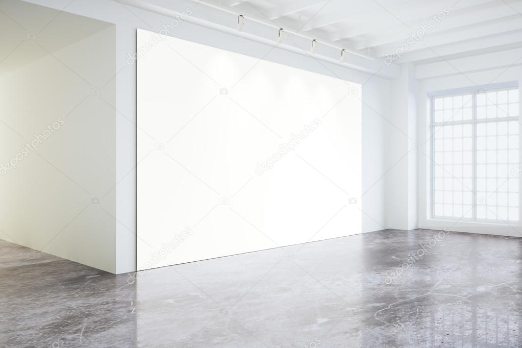Blank white poster on white wall in empty loft room with big win