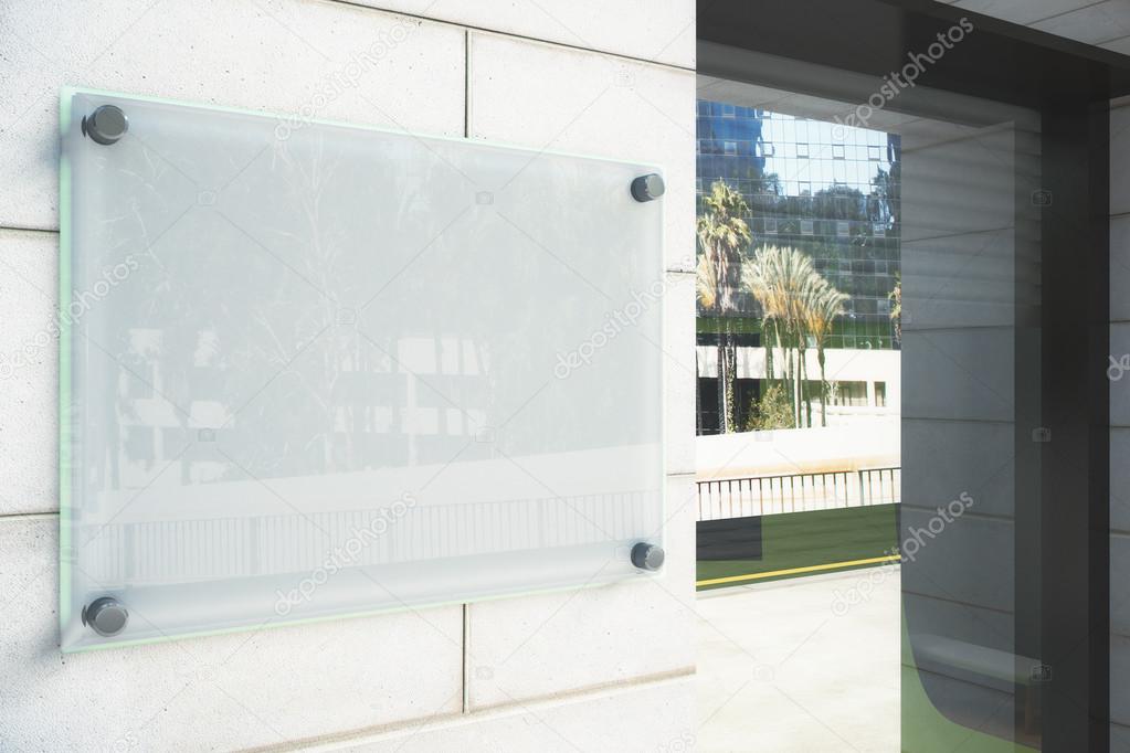 Blank glassy signboard on the wall outdoor, mock up