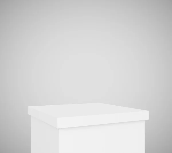 Pedestal blanco sobre fondo gris en blanco — Foto de Stock