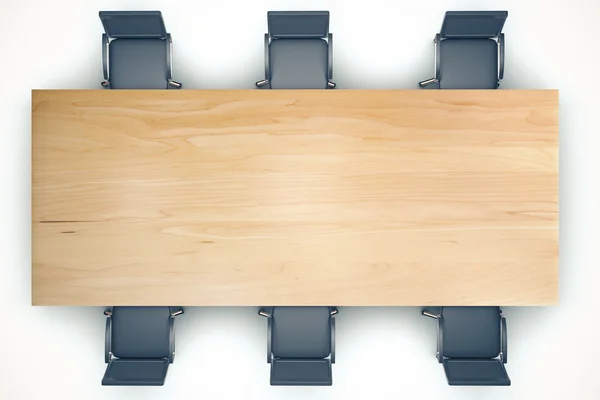 Top view on conference wooden table and black chairs — Stock Photo, Image