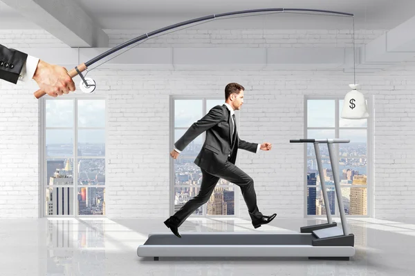 Profit-seeking concept with businessman running on a treadmill f — Stock Photo, Image