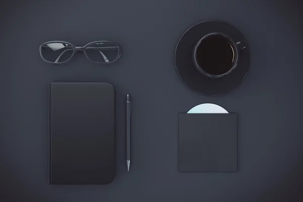 Schwarzer Tagebucheinband mit Tasse Kaffee, Brille und CD — Stockfoto