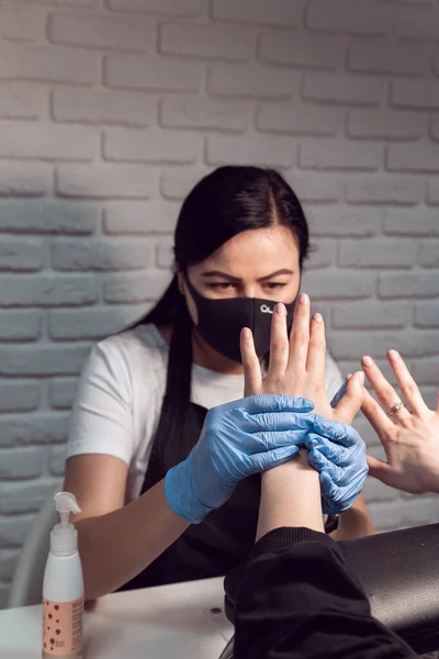 Manicurist Does Hand Massage Applying Hand Cream Female Hands Hardware — Stock Photo, Image