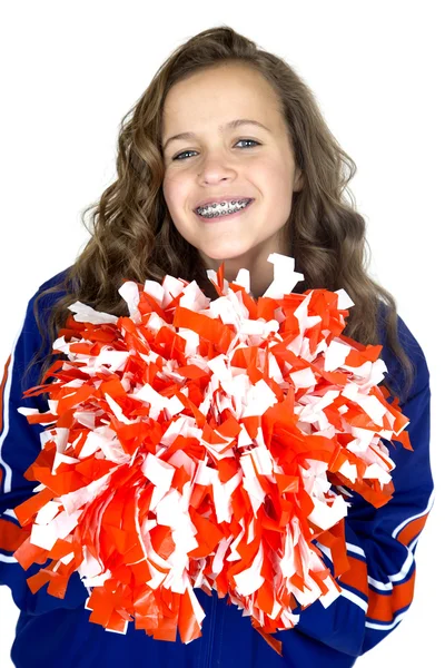 Adolescente cheerleader com pom poms sorrindo grande com brac ortodôntico — Fotografia de Stock