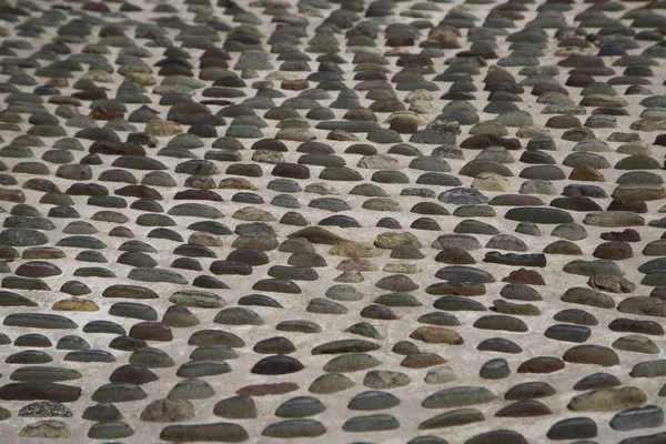 美しいユニークな石畳の通路の素晴らしい背景 — ストック写真