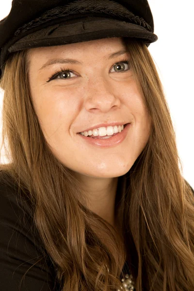 Brunette female model in Greek cap smiling — Stock Photo, Image