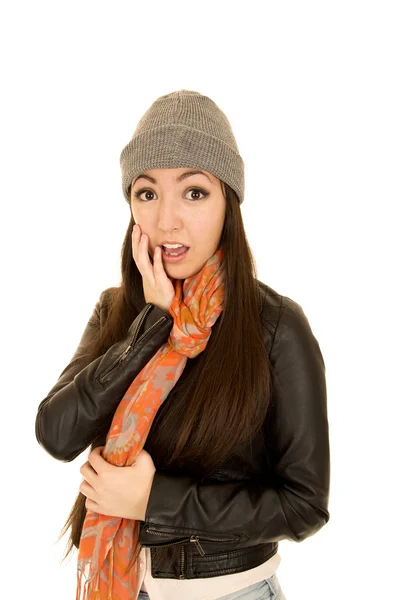 Shocked expression on female model's face wearing a winter beani — Stock Photo, Image