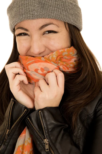 Coy teen model wearing a winter beanie and scarf — Stock Photo, Image